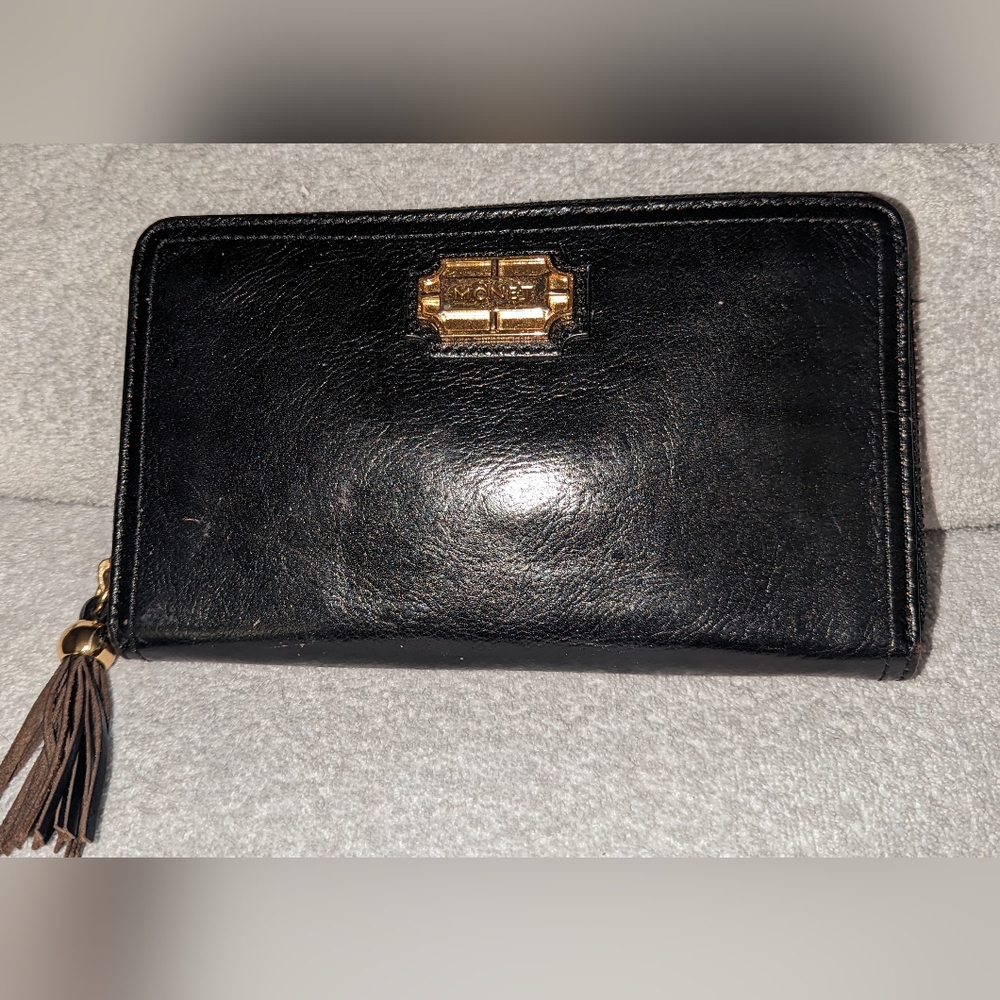 Vintage Monet black leather zip around wallet clutch.